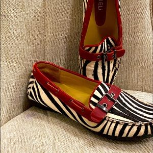 Van Eli calf striped driving shoe. Run small